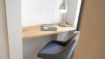 Just off the kitchen on the ground floor is a little nook with a view, ideal for reading or using a laptop. 