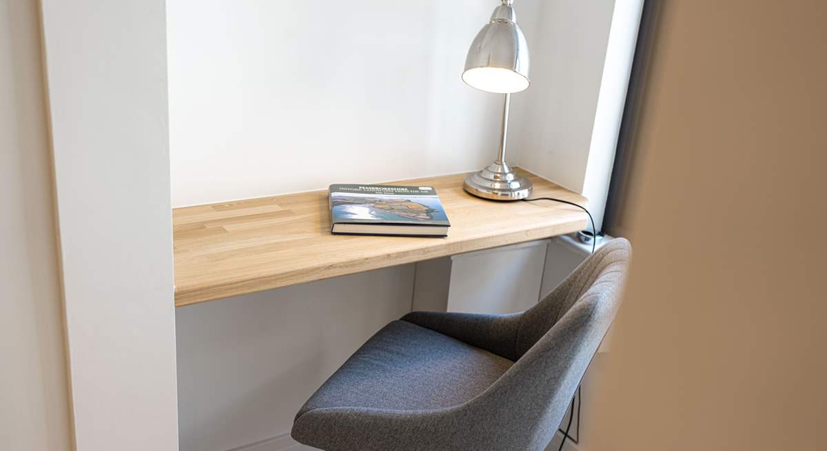 Just off the kitchen on the ground floor is a little nook with a view, ideal for reading or using a laptop. 