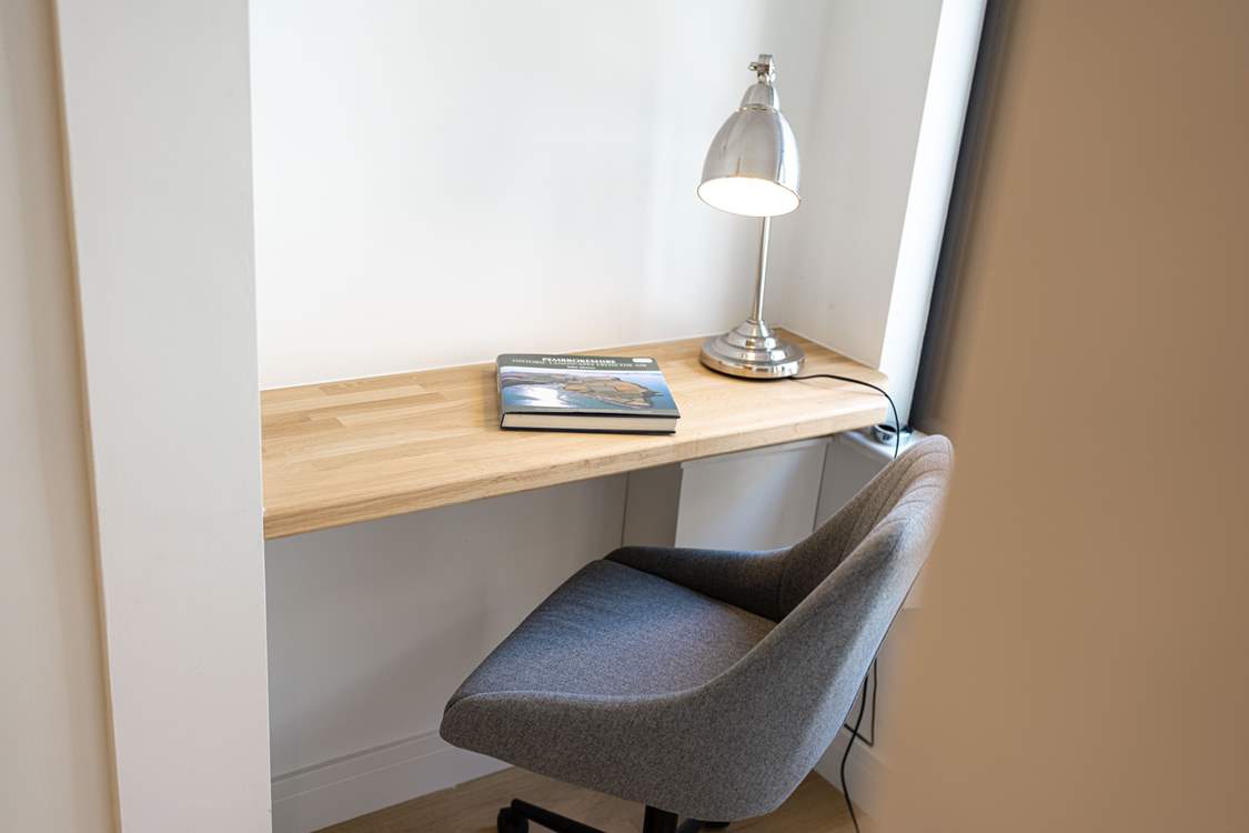 Just off the kitchen on the ground floor is a little nook with a view, ideal for reading or using a laptop.