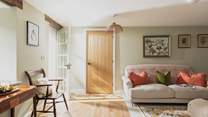 Muted tones complement the carefully selected furniture creating a lovely welcoming feeling. 