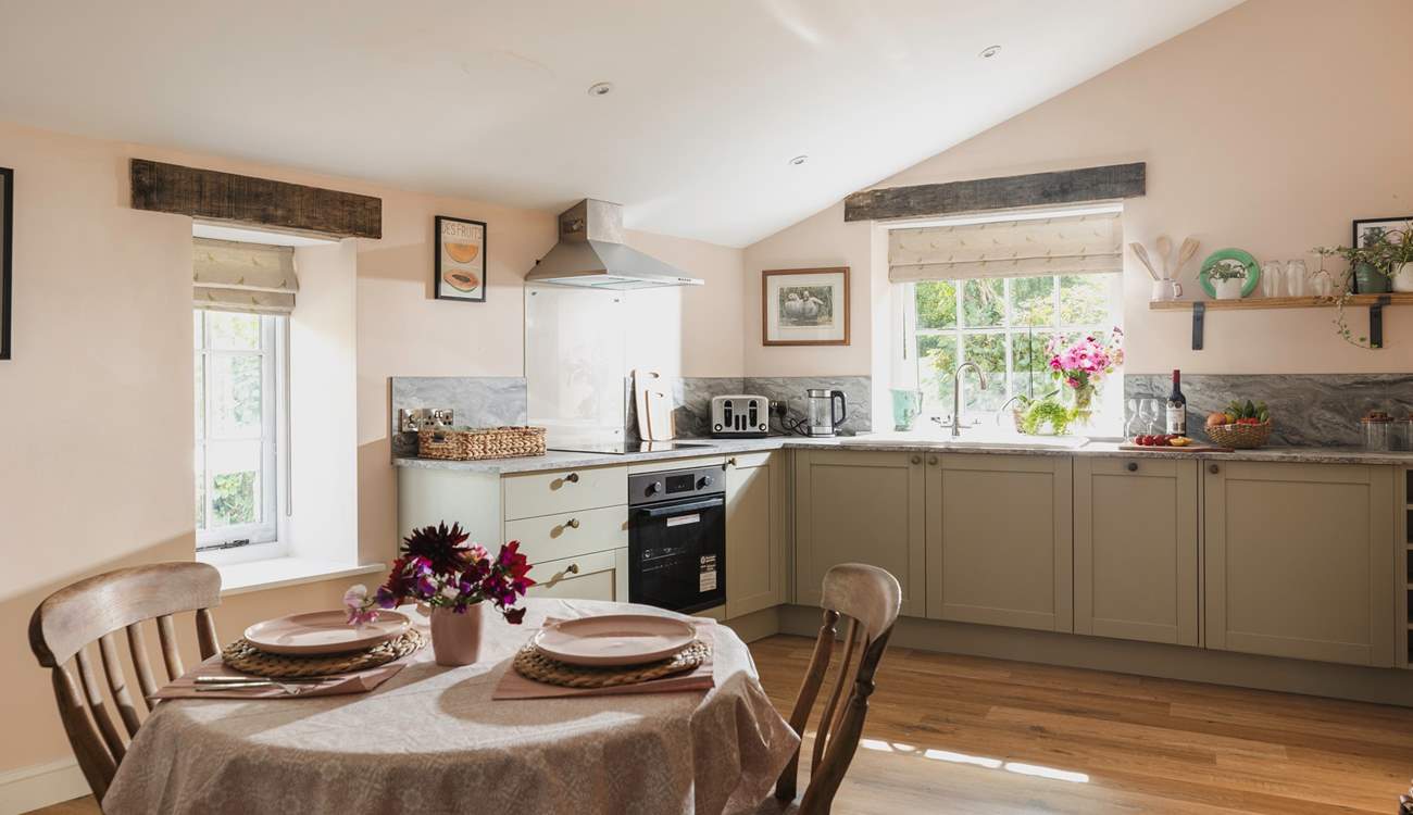 Walk through to the kitchen/diner and enjoy the view out to the garden. 