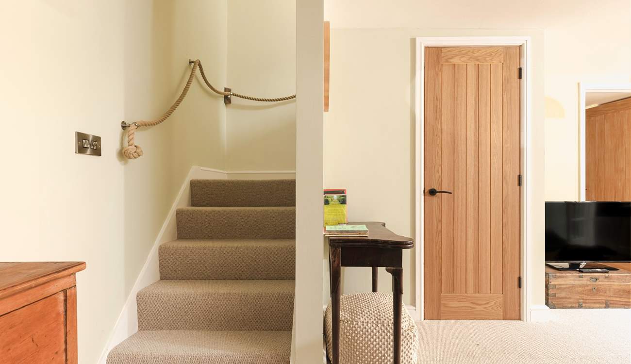 Head upstairs to the bedroom.