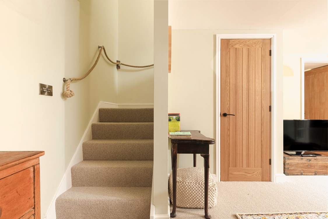 Head upstairs to the bedroom.