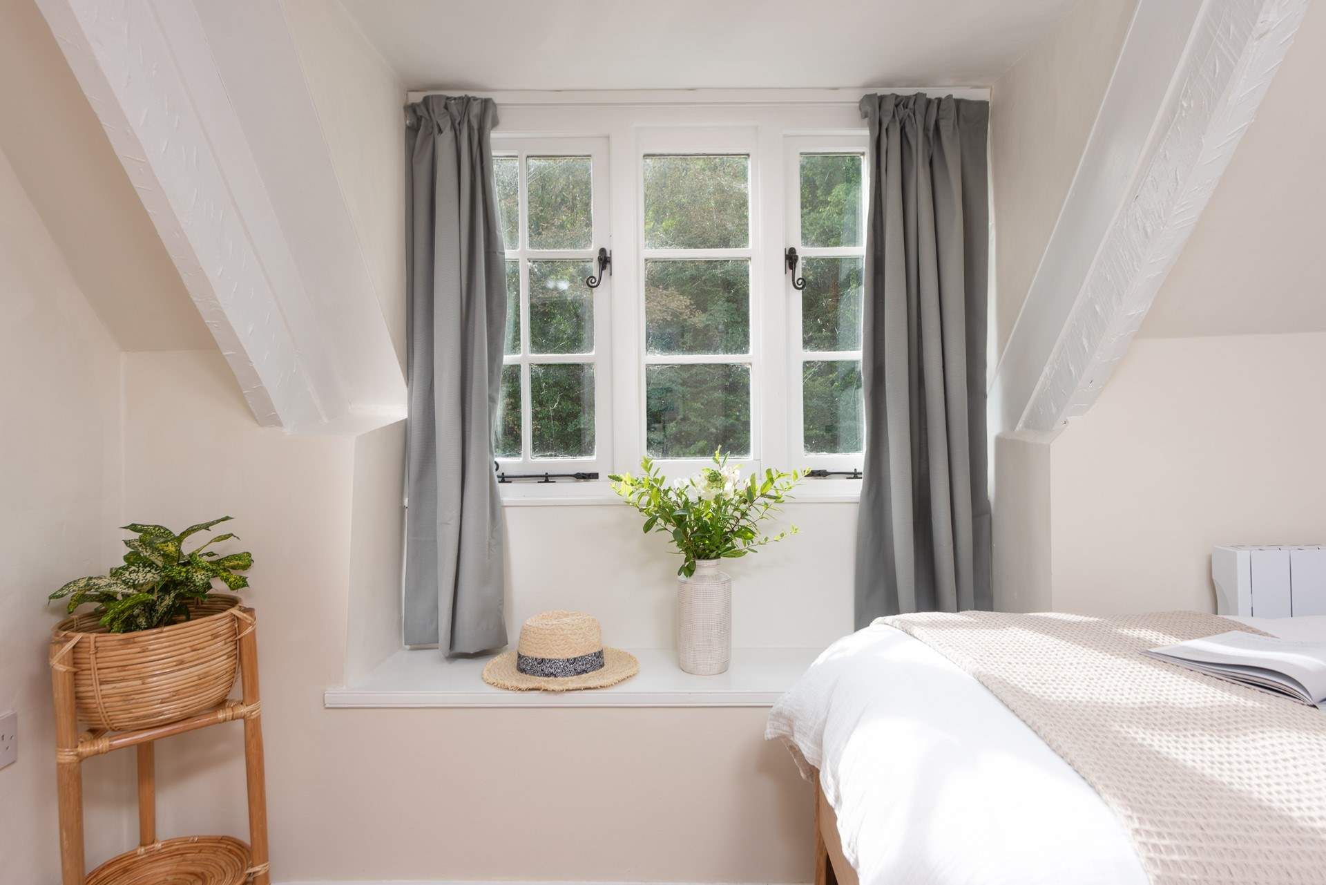 Enjoy a good book, perched on the window seat.