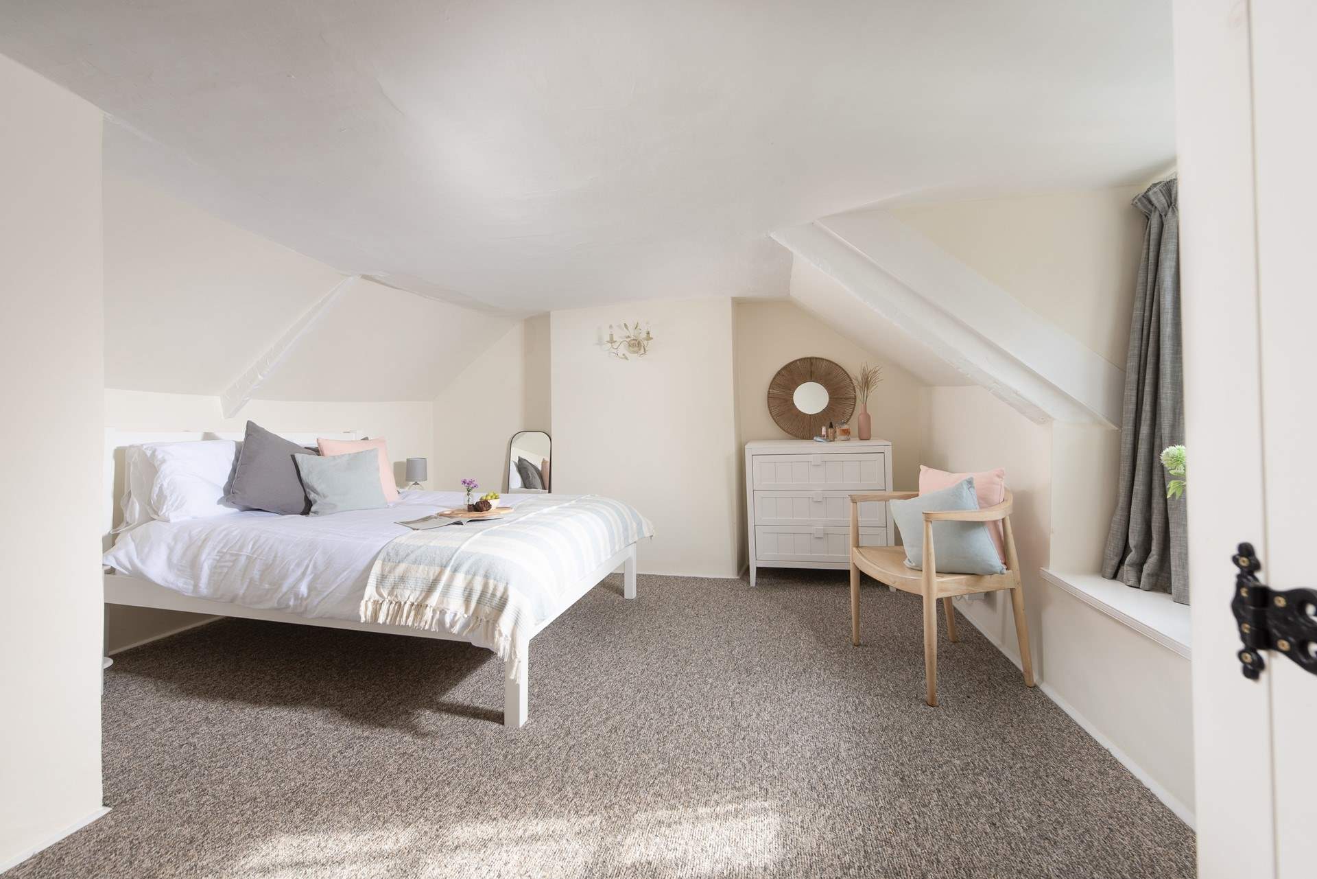 Bedroom two is up on the second floor - set under the eaves, the room is full of character.