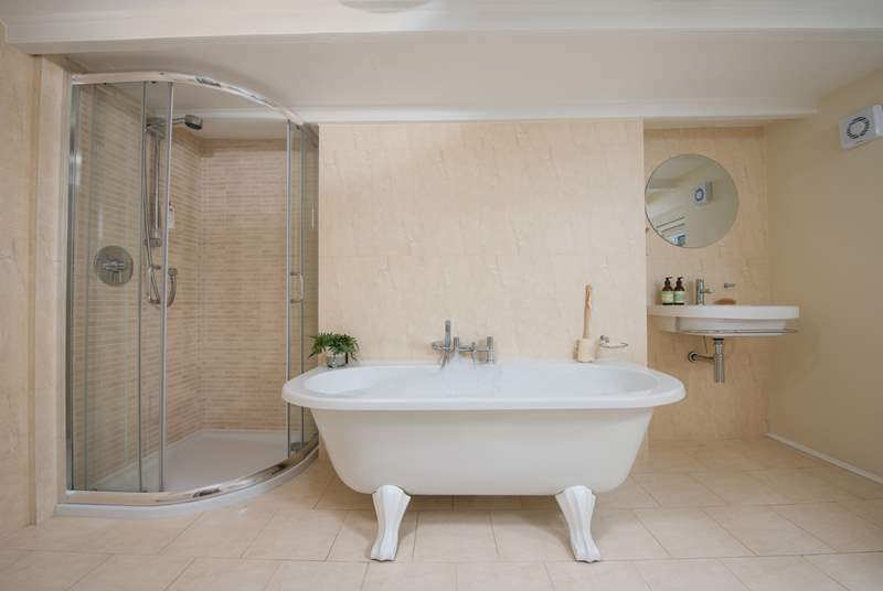 The spacious bathroom on the first floor offers a little bit of luxury with the free-standing bath.