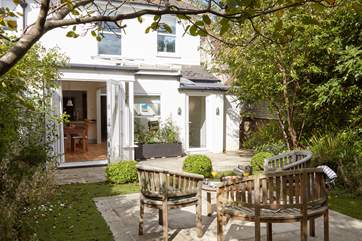 Access to the dining-room from the garden area and separate doorway to the inner hall, cloakroom, and utility-room.