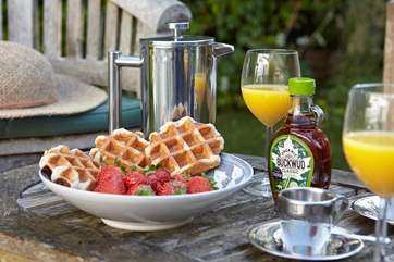Enjoy a morning coffee and a bite of breakfast in the garden