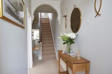 A warm welcoming hallway in Alton House with beautiful original features throughout.