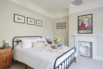 The large second bedroom with king-size bed.