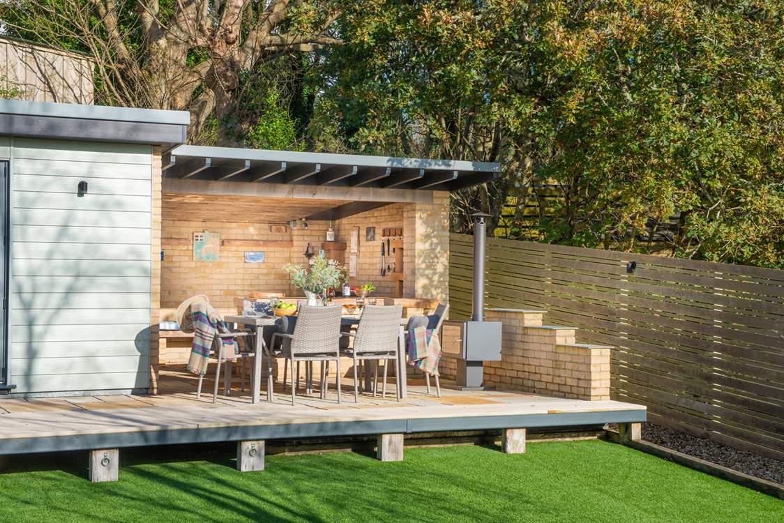 The real show stopper is the al fresco kitchen complete with barbecue, bar area, luxury seating and outdoor fire.