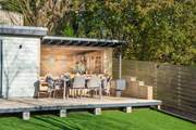 The real show stopper is the al fresco kitchen complete with barbecue, bar area, luxury seating and outdoor fire.