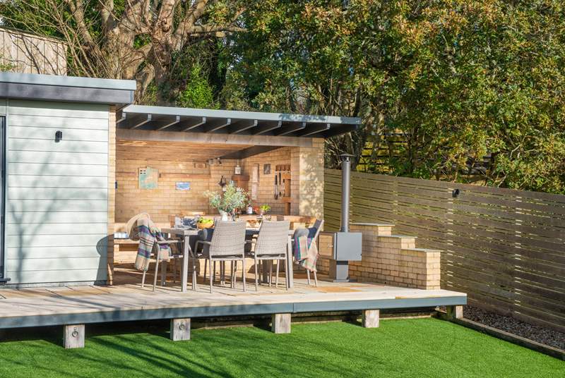 The real show stopper is the al fresco kitchen complete with barbecue, bar area and chiminea.