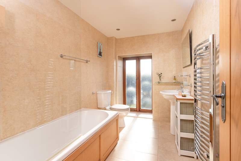 The sparkling family bathroom on the first floor.