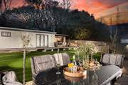 Such a versatile garden, enjoy the fresh air all year round. Please note, the summer house to the left of the al fresco kitchen is private.