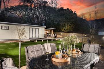 Such a versatile garden, enjoy the fresh air all year round. Please note, the summer house to the left of the al fresco kitchen is private.