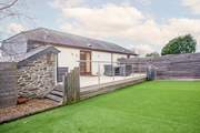 Access to the garden is found through the French doors on the first floor and leads out to this gorgeous decking.