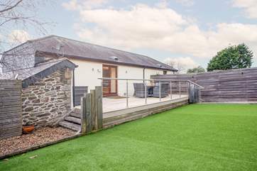 Access to the garden is found through the French doors on the first floor and leads out to this gorgeous decking.