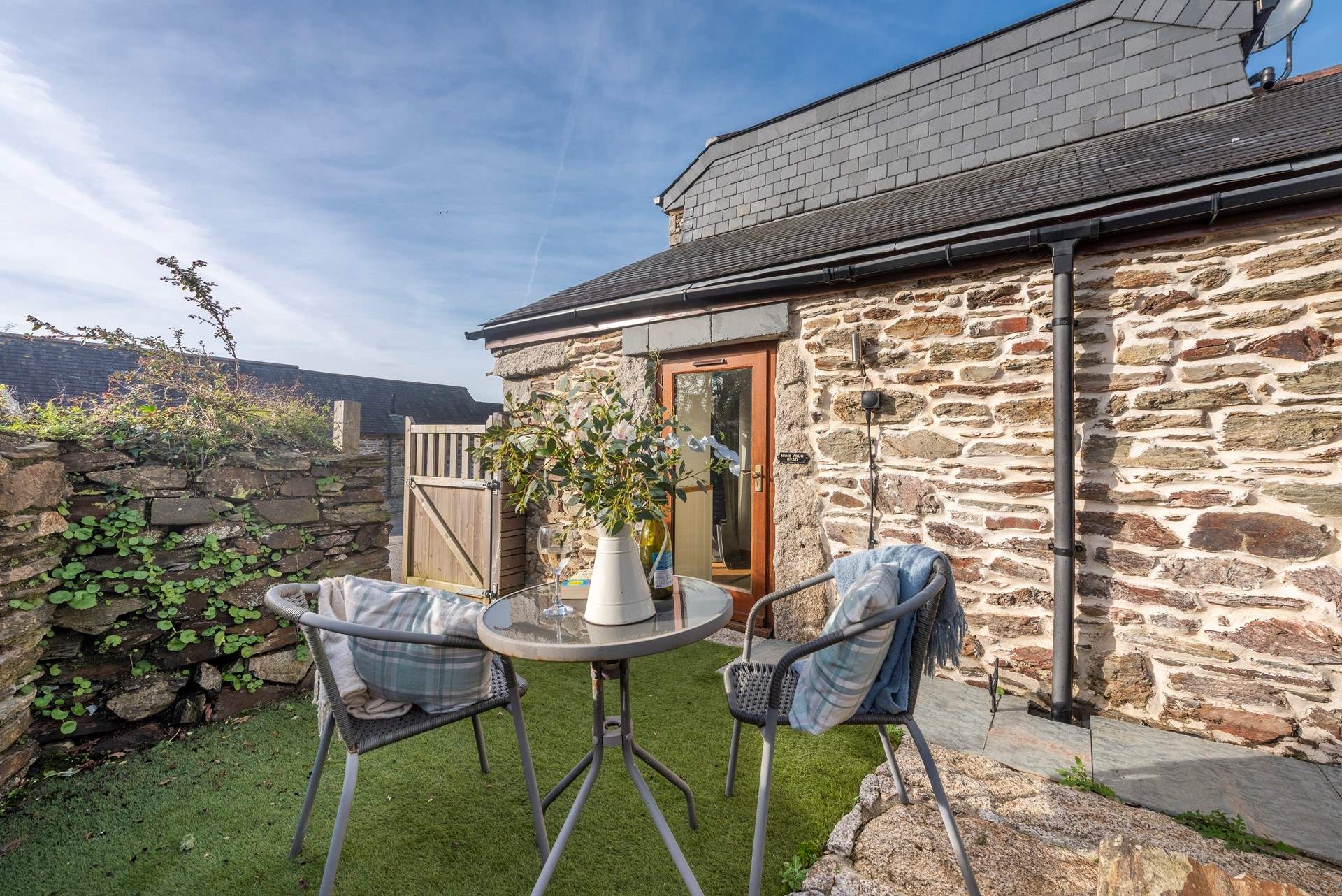 The side elevation to Ash has another beautiful area to sit and enjoy the sunshine.