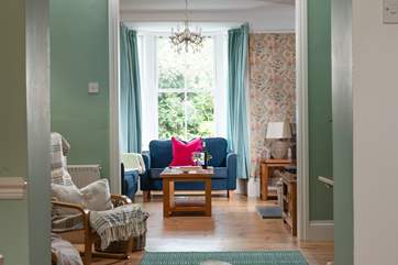 Exposed pine floors and comfy sofas invite you to relax and unwind and in cooler months the wood-burner will keep you warm and toasty.