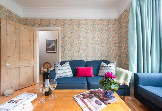 Exposed pine floors and comfy sofas invite you to relax and unwind and in cooler months the wood-burner will keep you warm and toasty. 