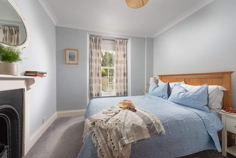 Bedroom two is charming and overlooks the rear garden. 