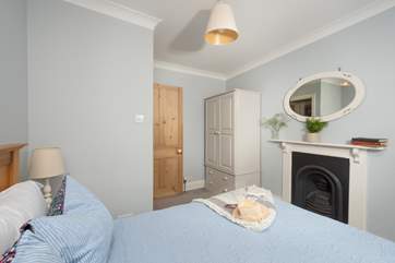 Original features can be found throughout No 2, like this ornamental fireplace.