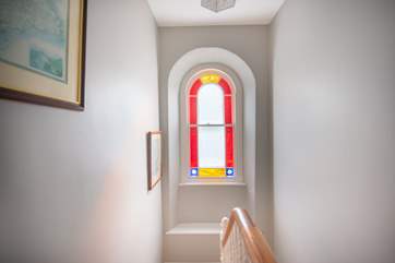 The beautiful stained glass window.