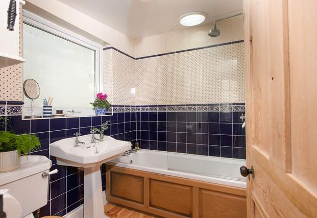 The traditional family bathroom is located on the ground floor. Enjoy a relaxing soak after a day out walking the coast path...