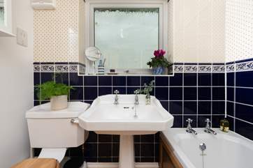 The traditional family bathroom is located on the ground floor.
