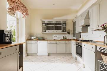 Share a glass of wine in the kitchen as you prepare your evening meal.