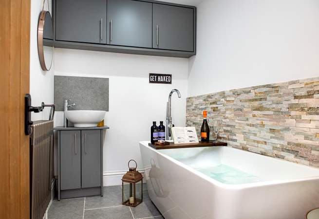The bathroom really is a treat, the perfect spot to soak and relax. This room also has a sink and sits opposite the shower-room on the ground floor.