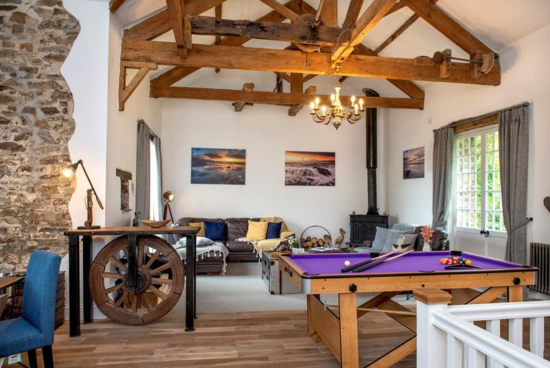 A room that brings the family all together, with the original mill works taking pride of position thanks to the vaulted ceiling. 