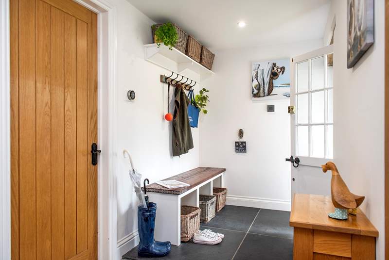 The entrance hall offers the perfect spot to tuck away those shoes and coats.