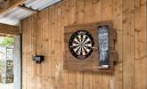 On a rainy day the dart board in the car port will be a great option! - Thumbnail Image