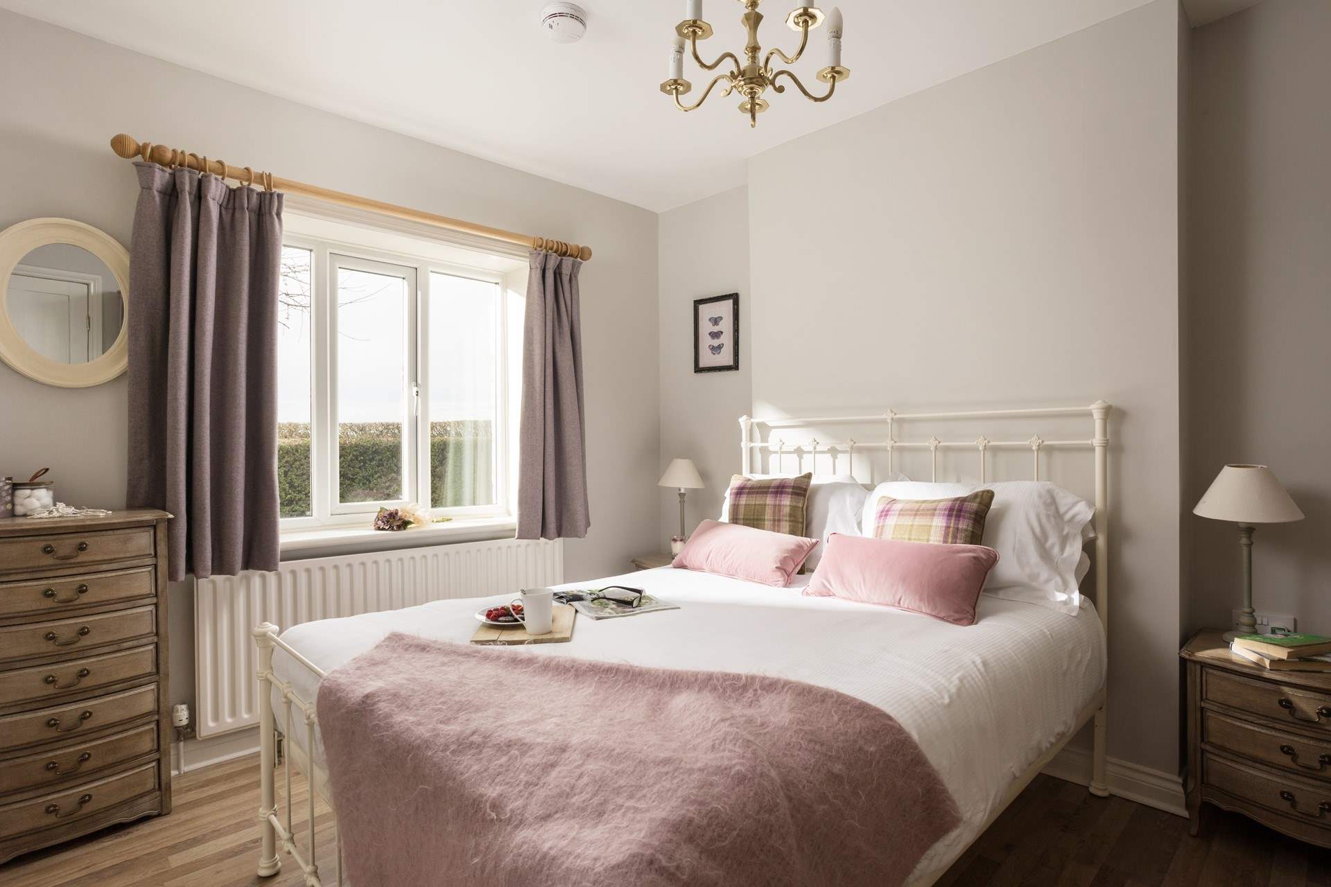 The ground floor bedroom looks so inviting.