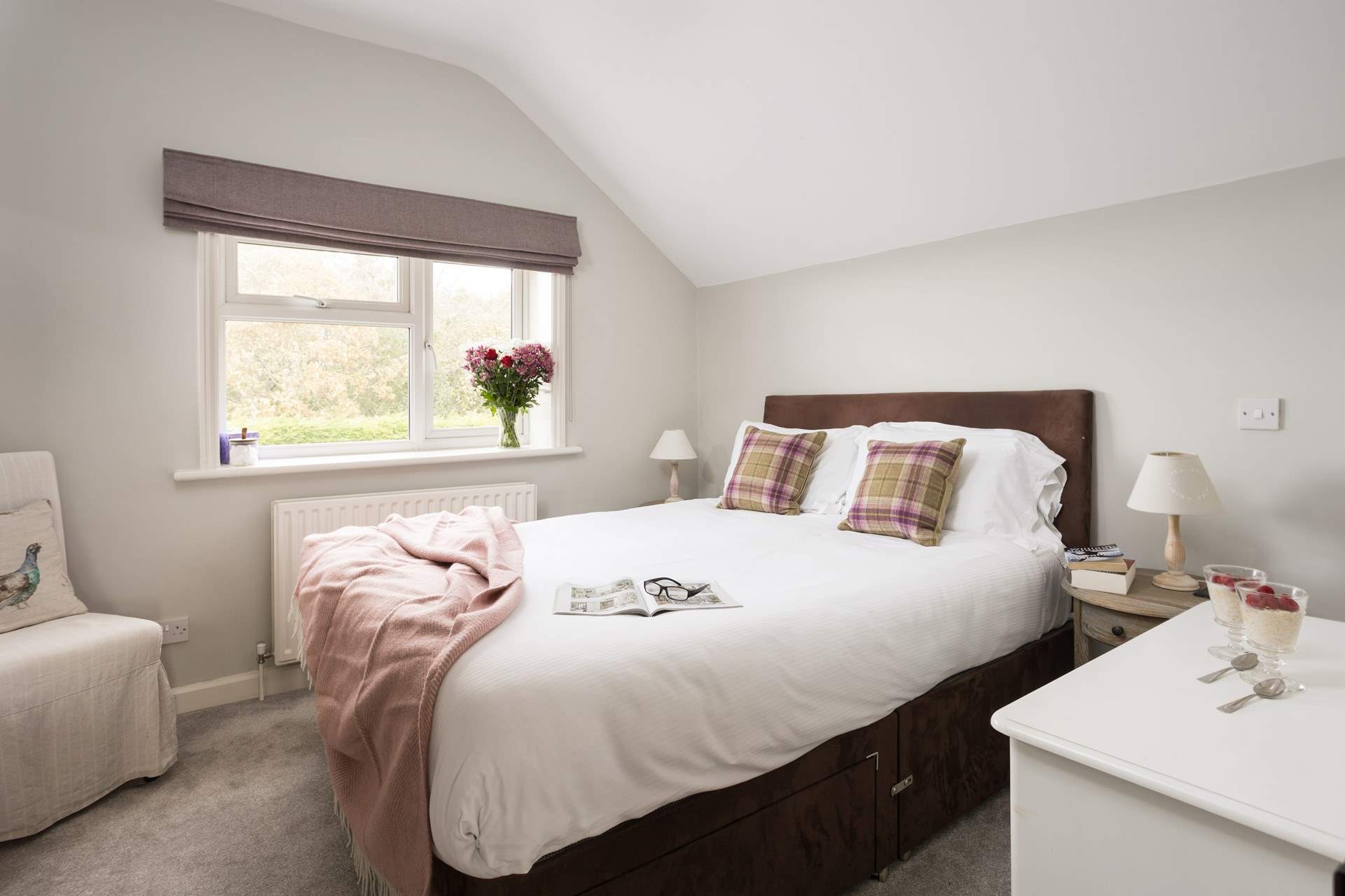 This pretty bedroom has an en suite.