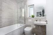 The contemporary family bathroom.