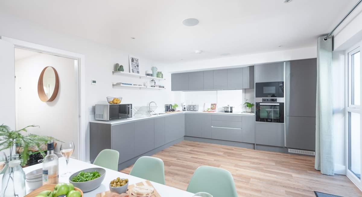 The open plan kitchen area is the perfect place to enjoy long chilled evenings.