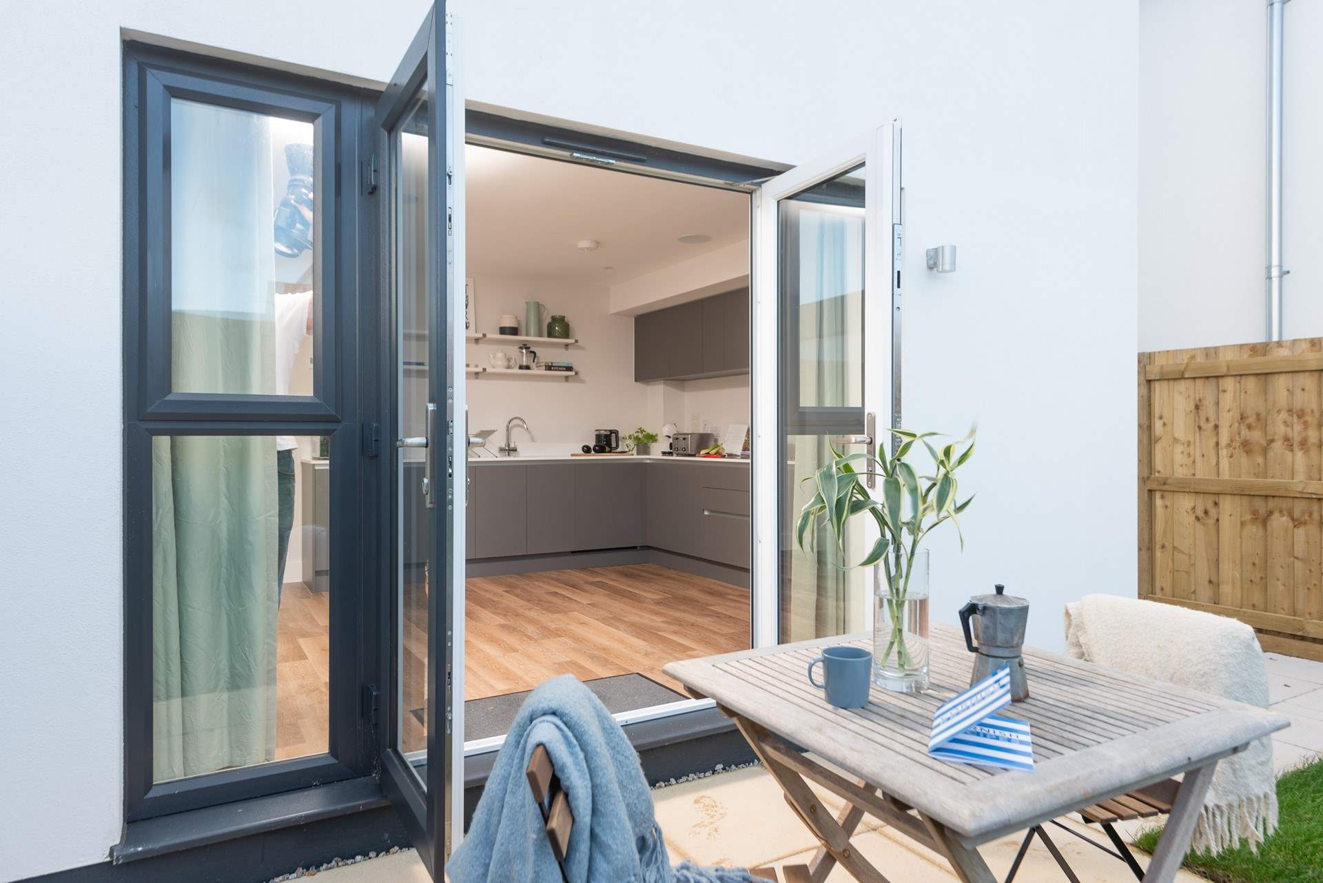 Open up the French doors and let the outside in...