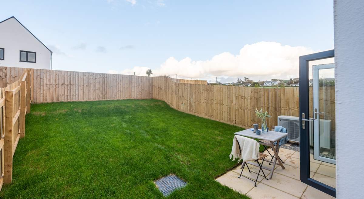 The fenced garden is the perfect spot for your pooch to have a run about in. 