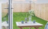 Double doors open to the patio and lawned garden -  enjoy your morning coffee in the sunshine.  - Thumbnail Image