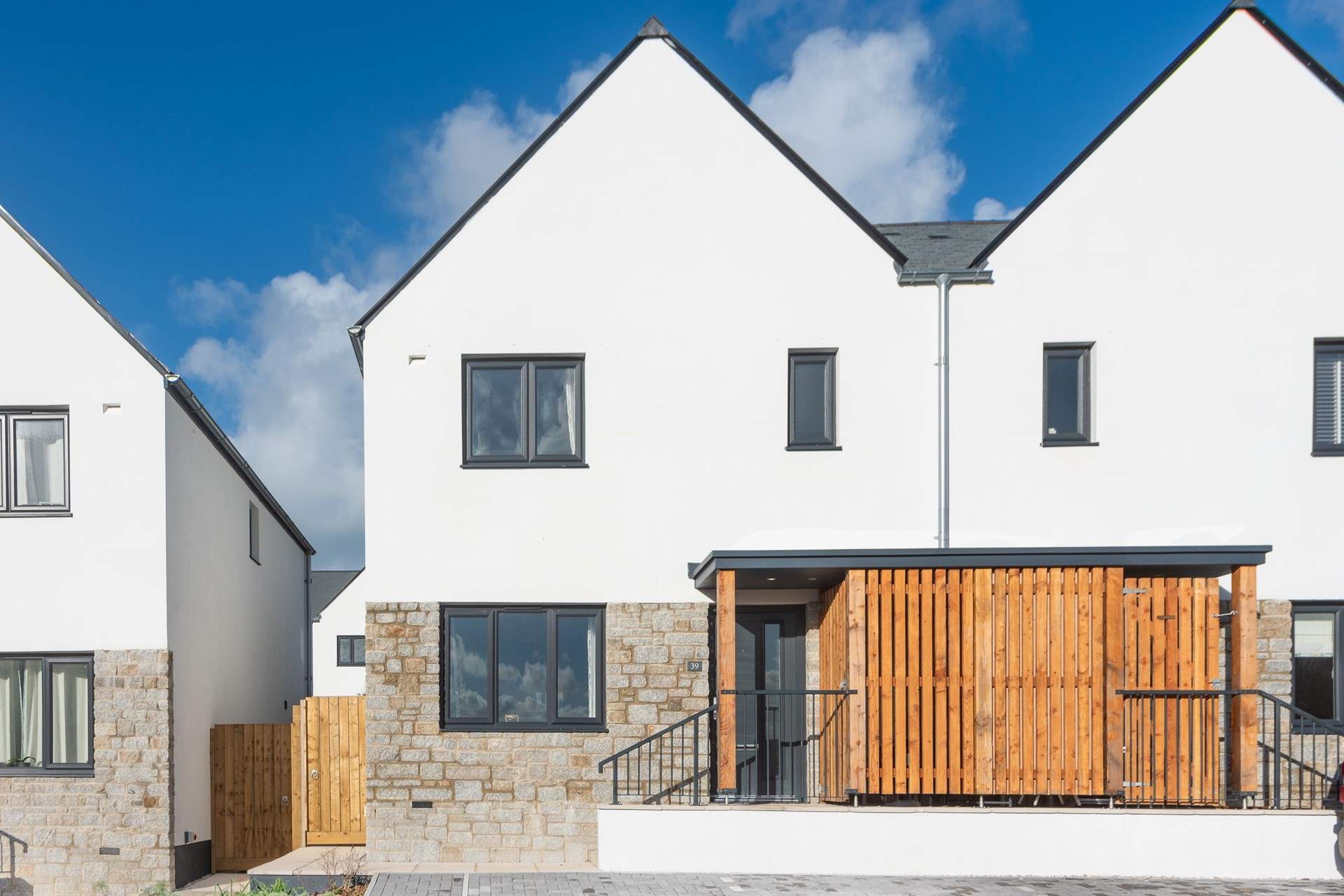 Three steps lead up to the front door.