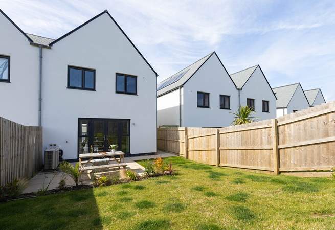 The fenced garden is perfect for your pooch to have a run about in. 