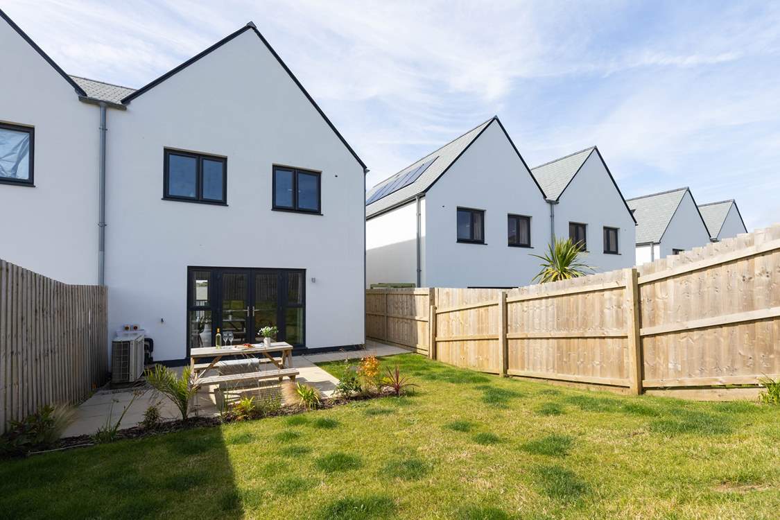 The fenced garden is perfect for your pooch to have a run about in.