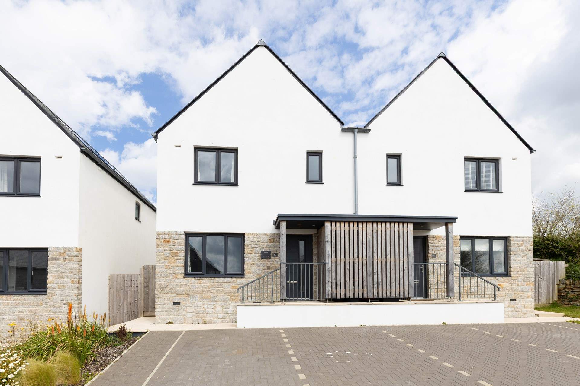 Welcome to Hillside, three steps lead to your front door where restfulness awaits (house on the left). 