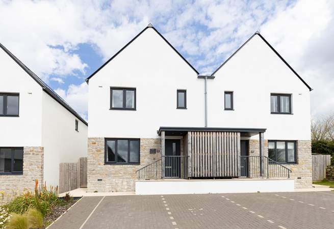 Welcome to Hillside, three steps lead to your front door where restfulness awaits (house on the left). 