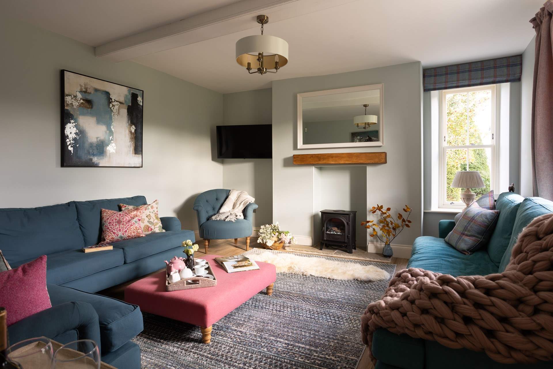 Such a calming snug with its pale pinks and blues.