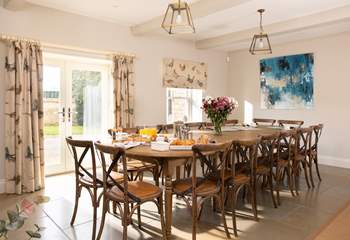 The dining-room leads out onto a sunny terrace.