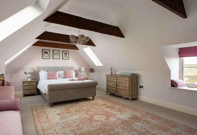 You will be enveloped in luxury in this fabulous bedroom.